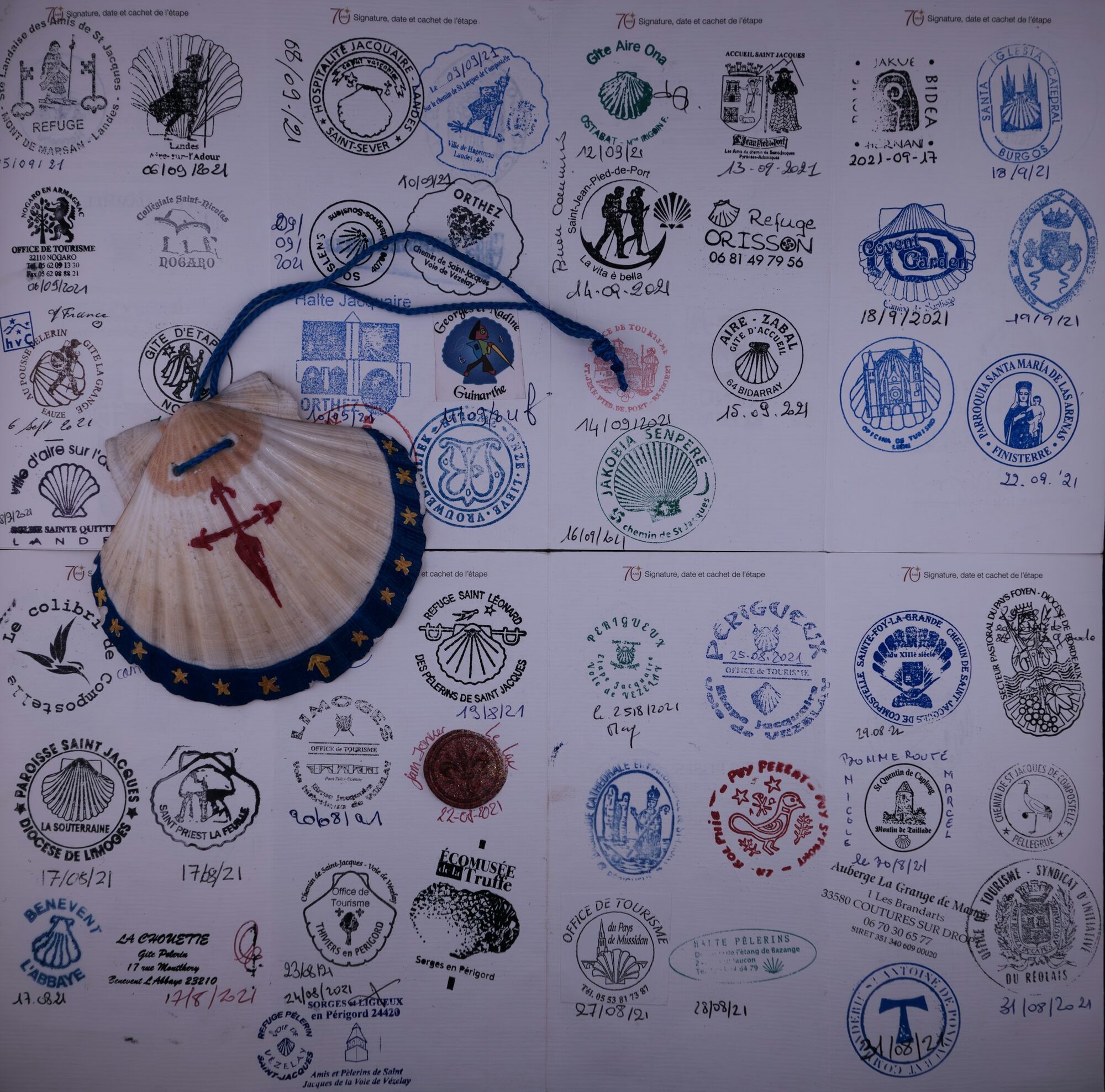Travel journal filled with souvenir stamps