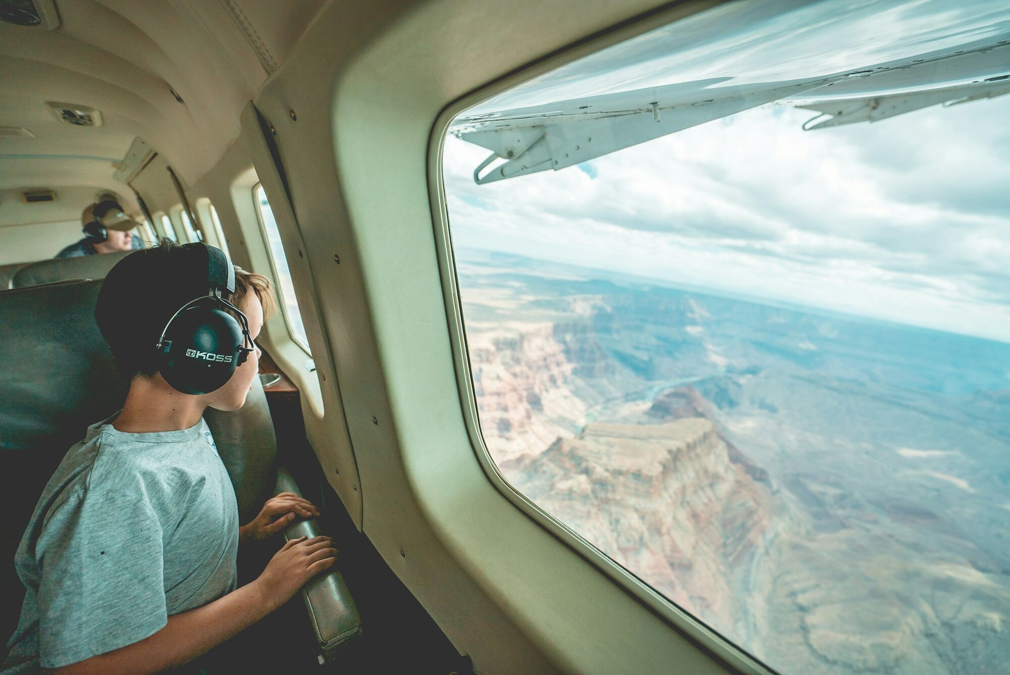 Child looking out of an aircraft window