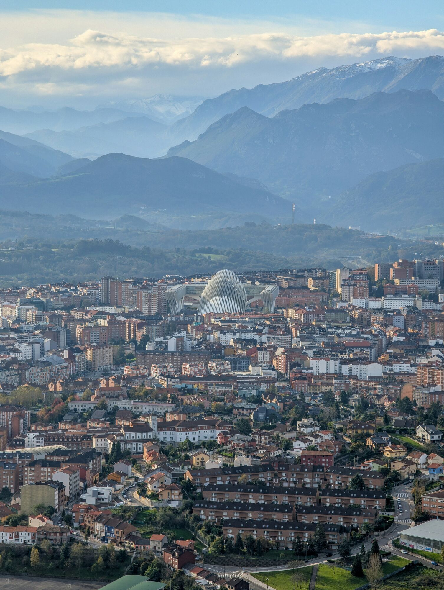 Oviedo city skyline with mountains in the background