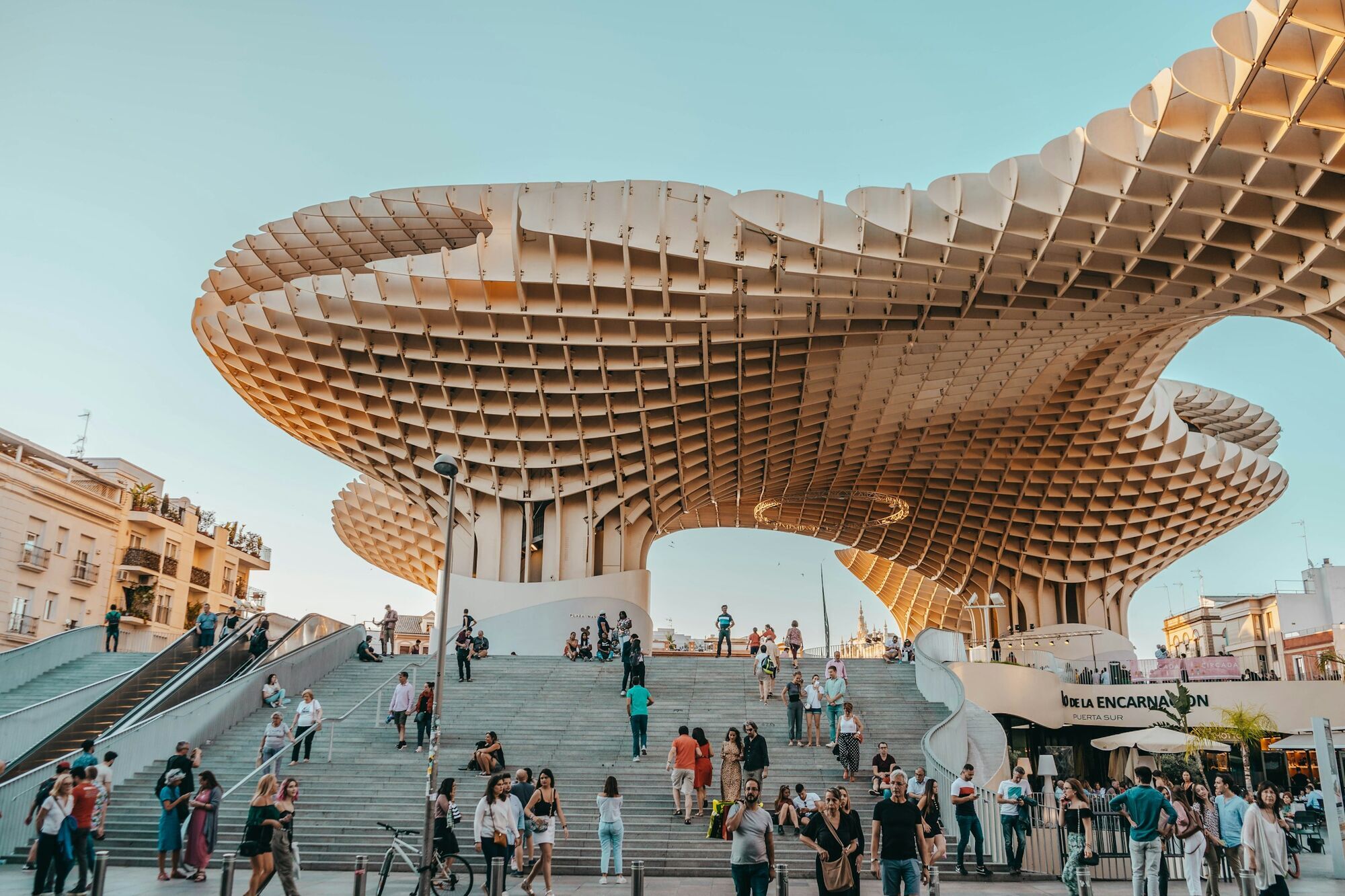 People walking around Metropol Parasol in Seville