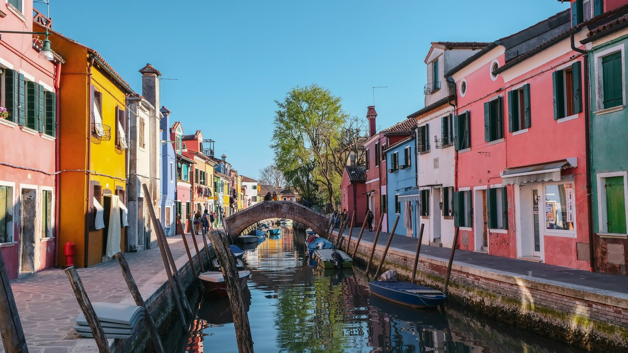 Colourful canal houses and a small bridge on Burano island near Venice