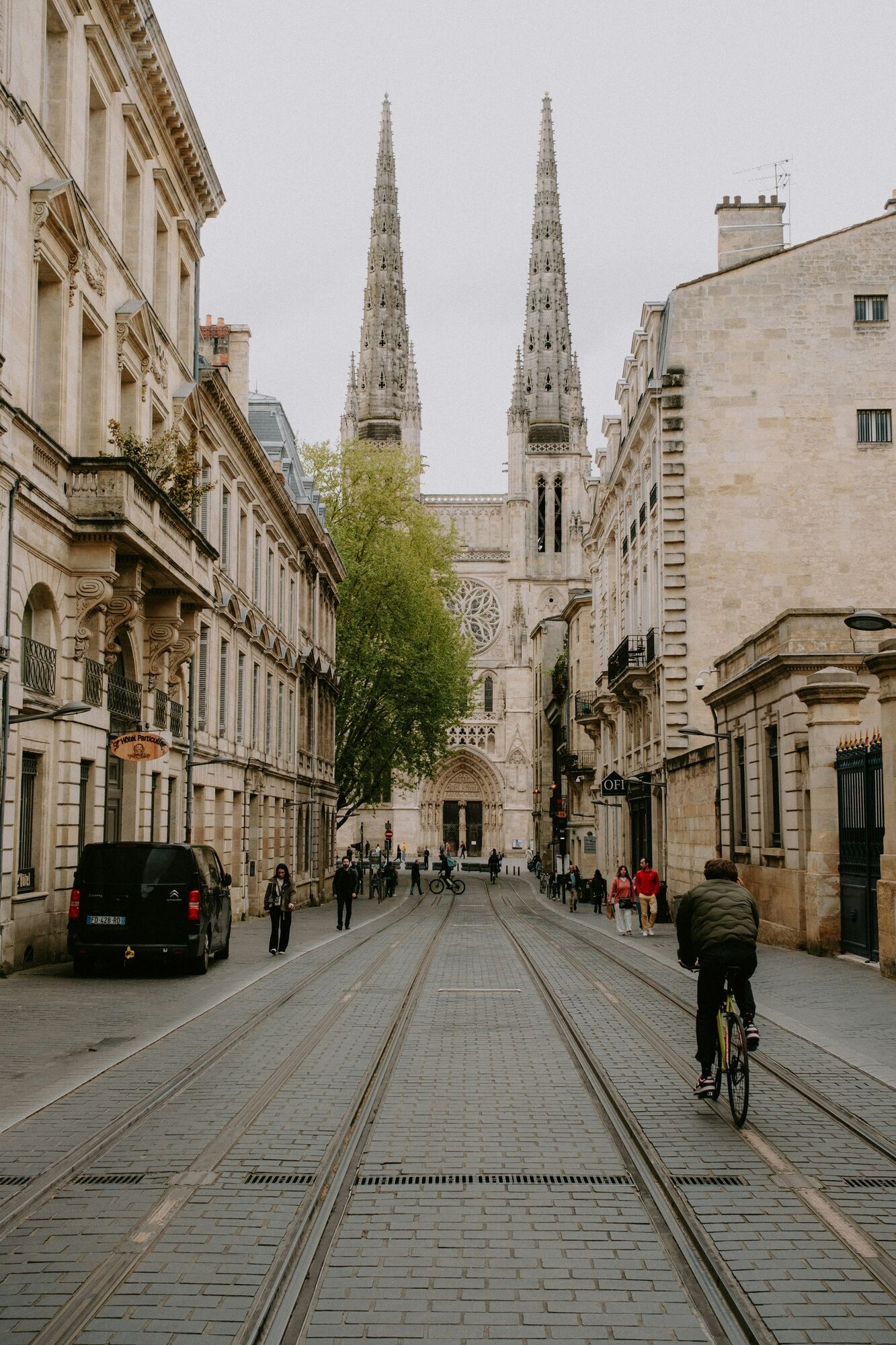 Bordeaux street with tram tracks and Saint-André Cathedral