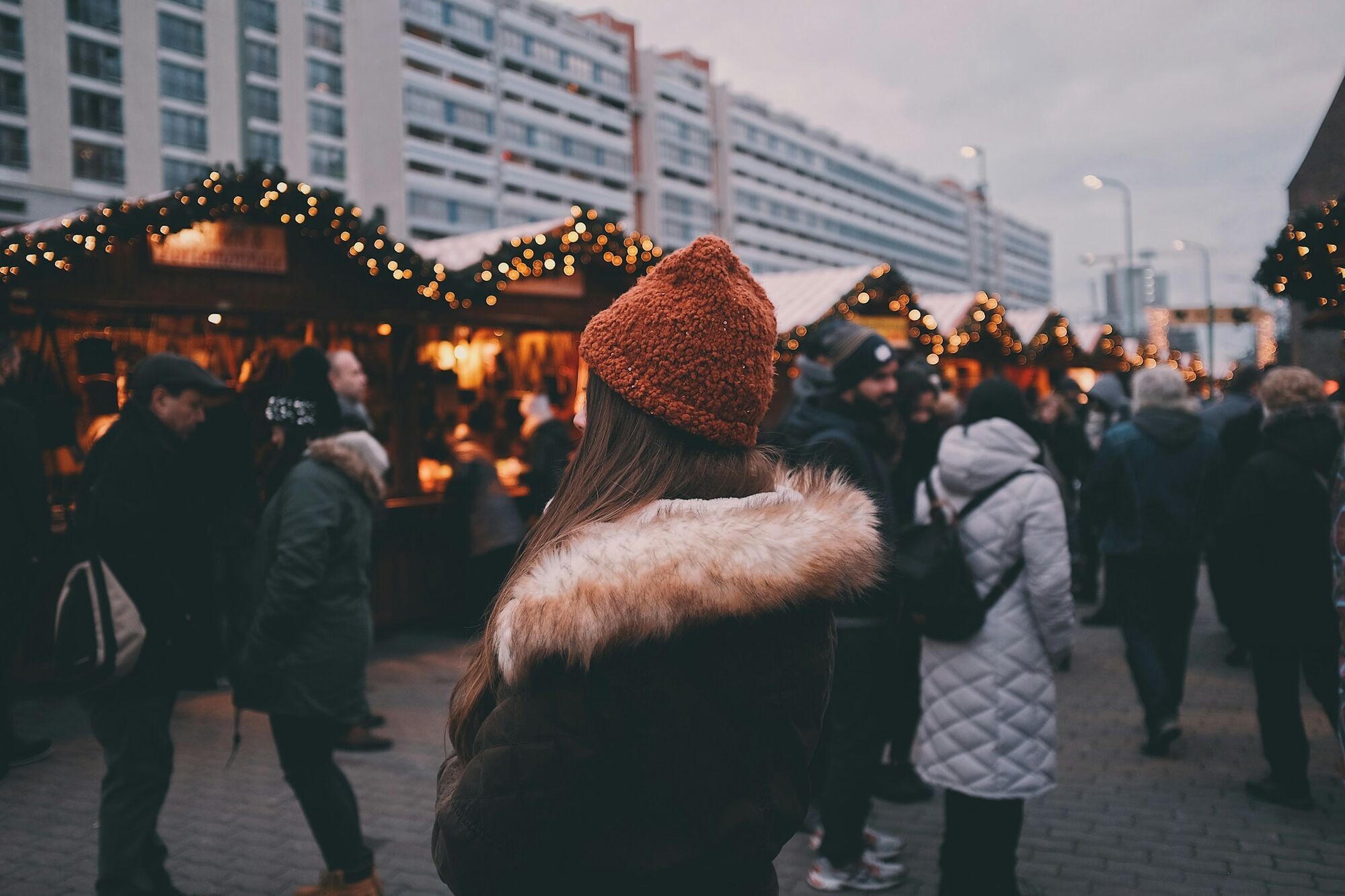 People visiting a winter market in Berlin