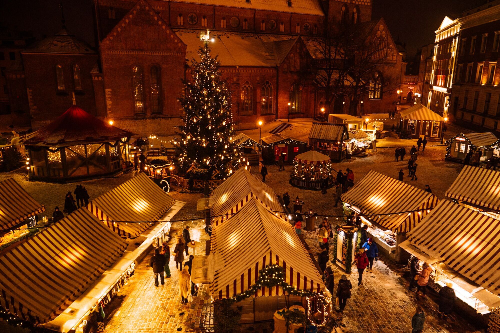 Christmas market stalls lit up at night in Nuremberg