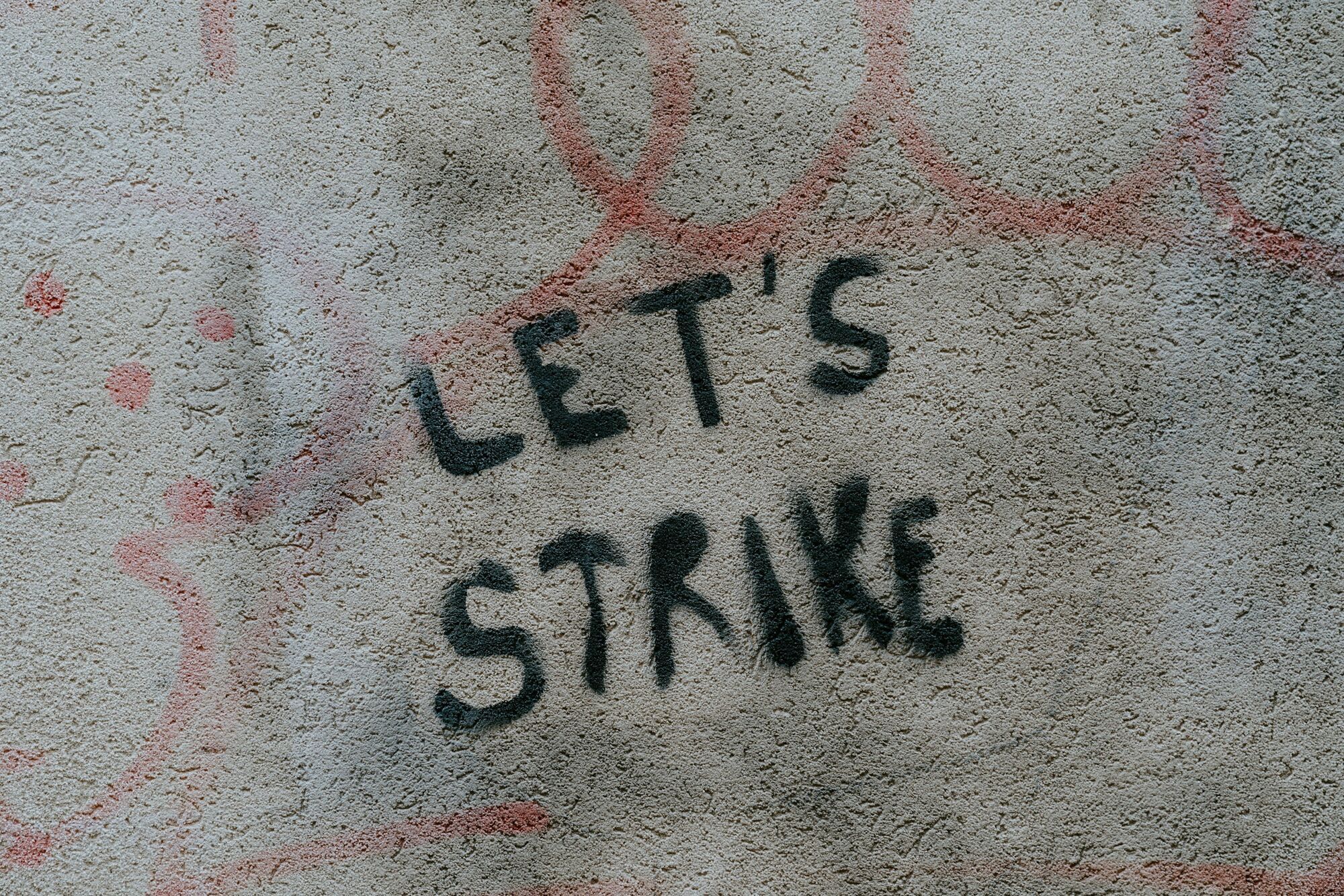 Let’s strike graffiti on a concrete wall