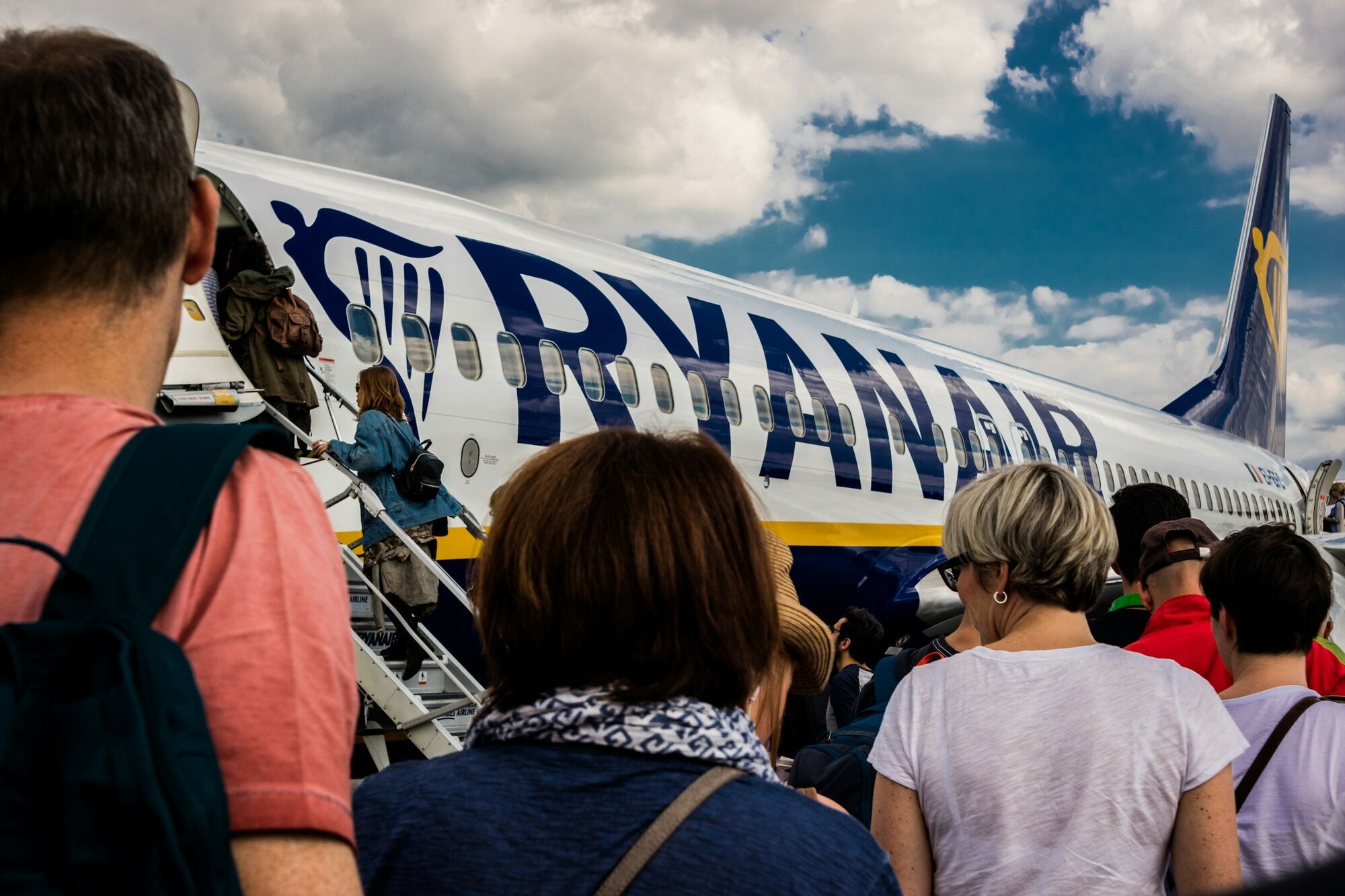 Passengers boarding a Ryanair aircraft on the tarmac