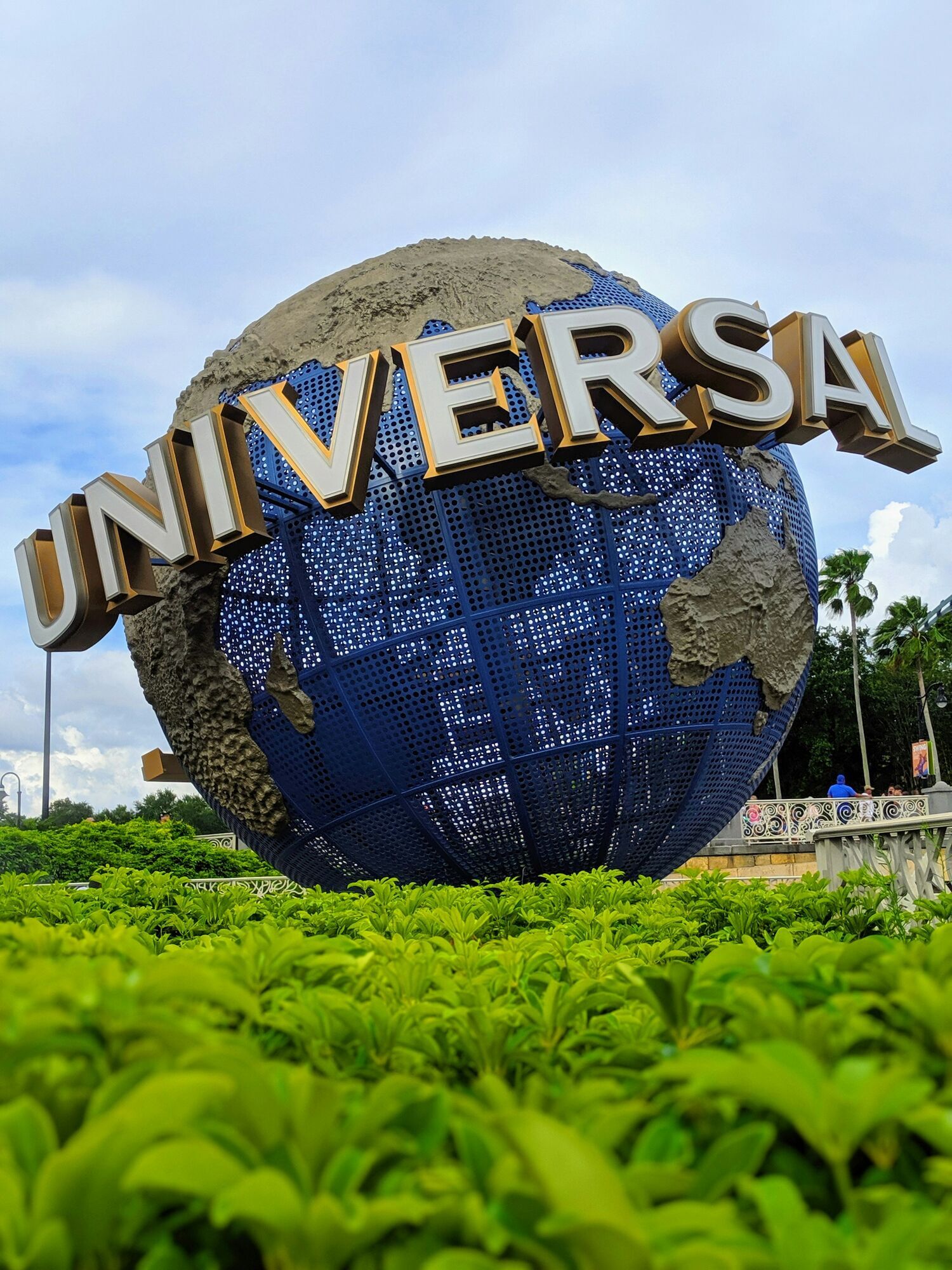 Universal globe sign at a theme park entrance