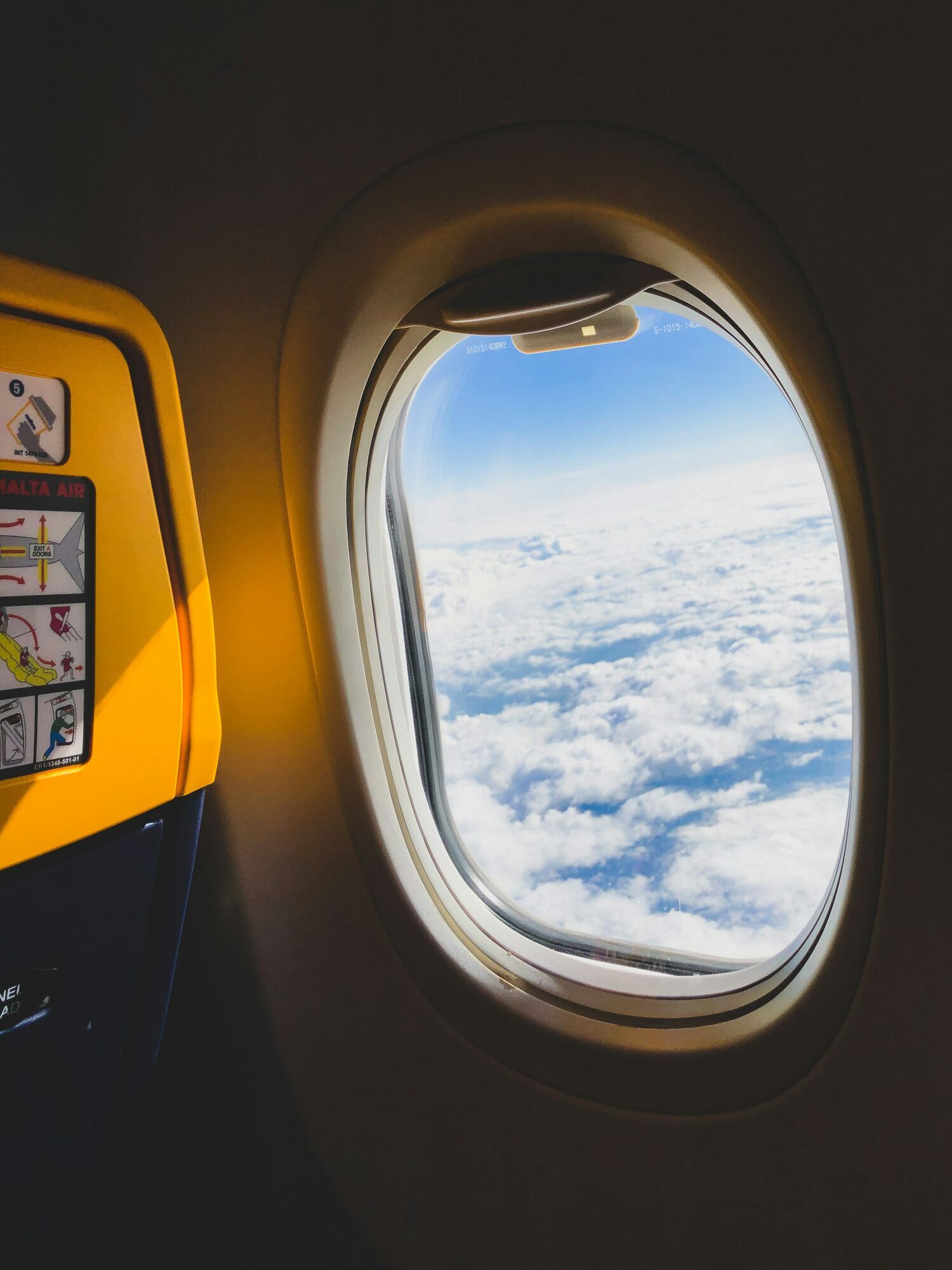 Passengers seated inside an aircraft cabin