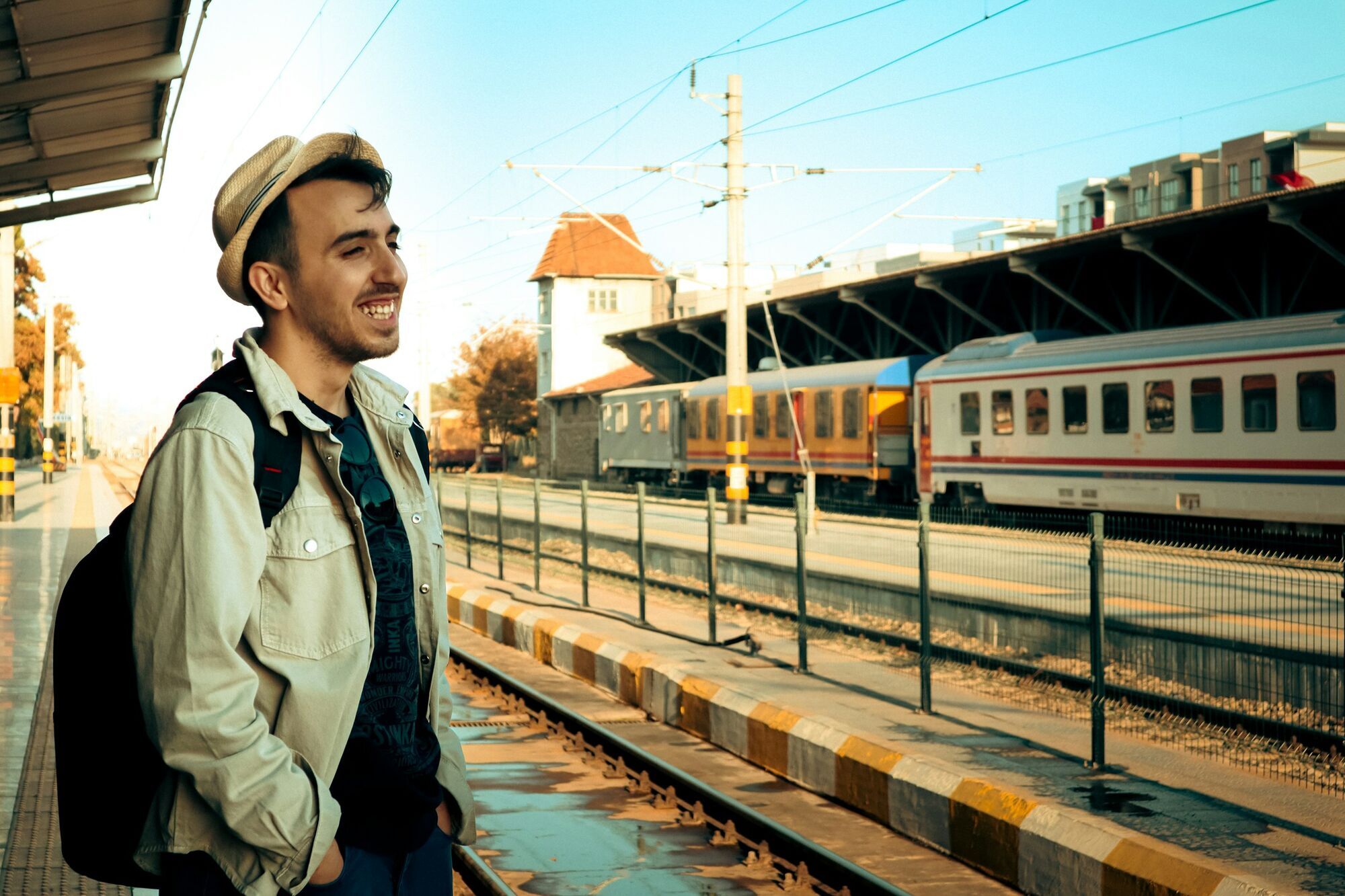 Traveller waiting beside a railway platform