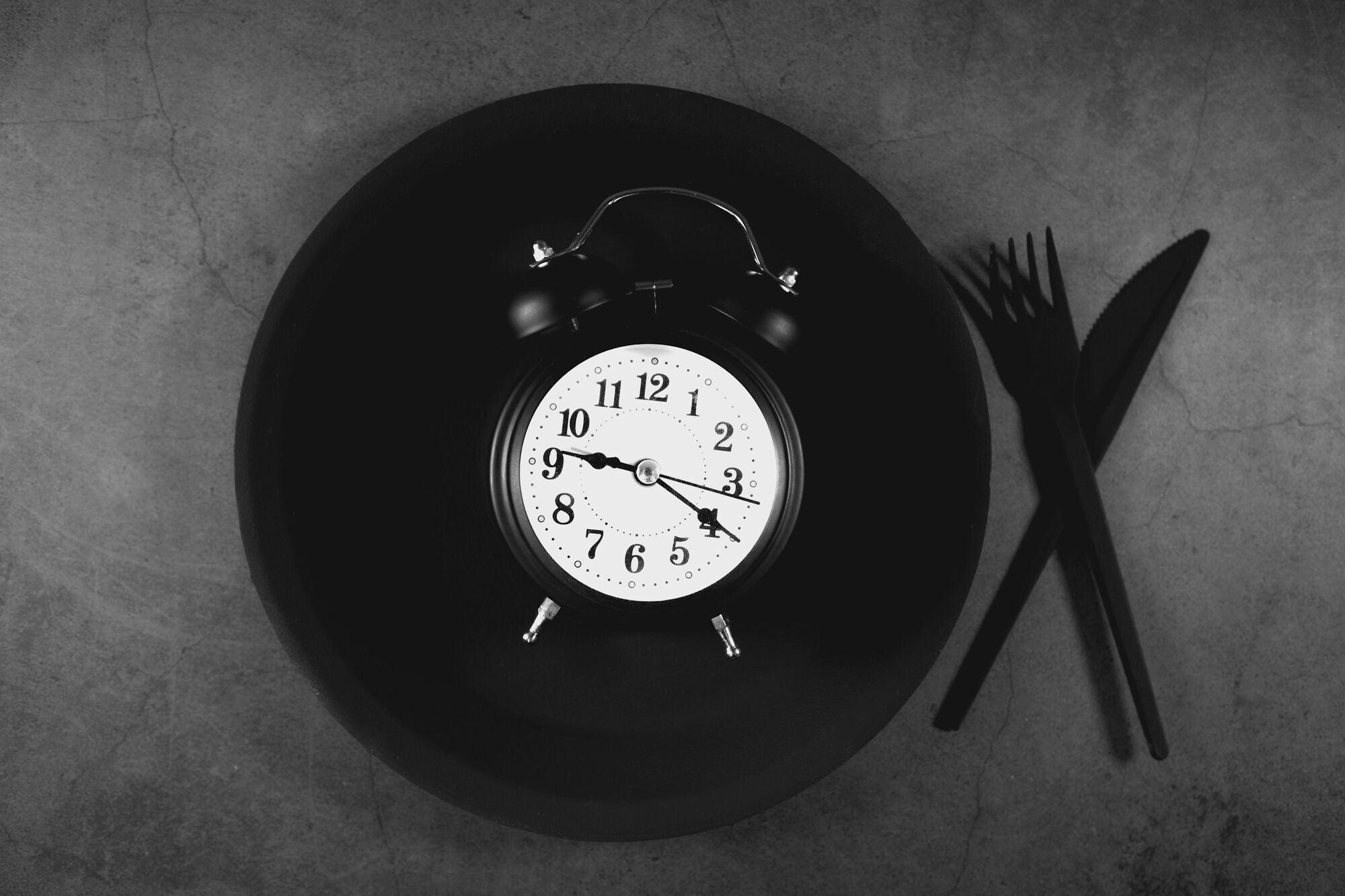 Alarm clock served on a plate
