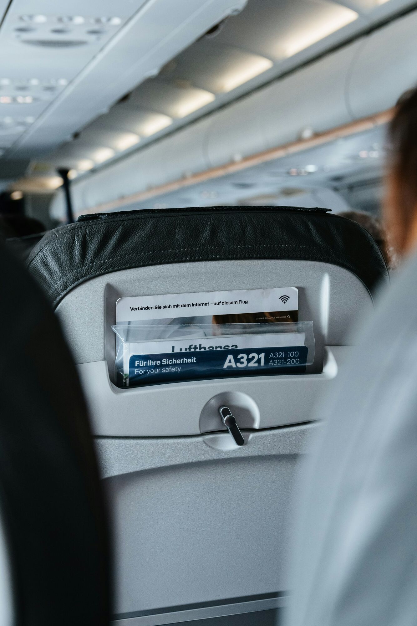 Economy seat inside a Lufthansa aircraft