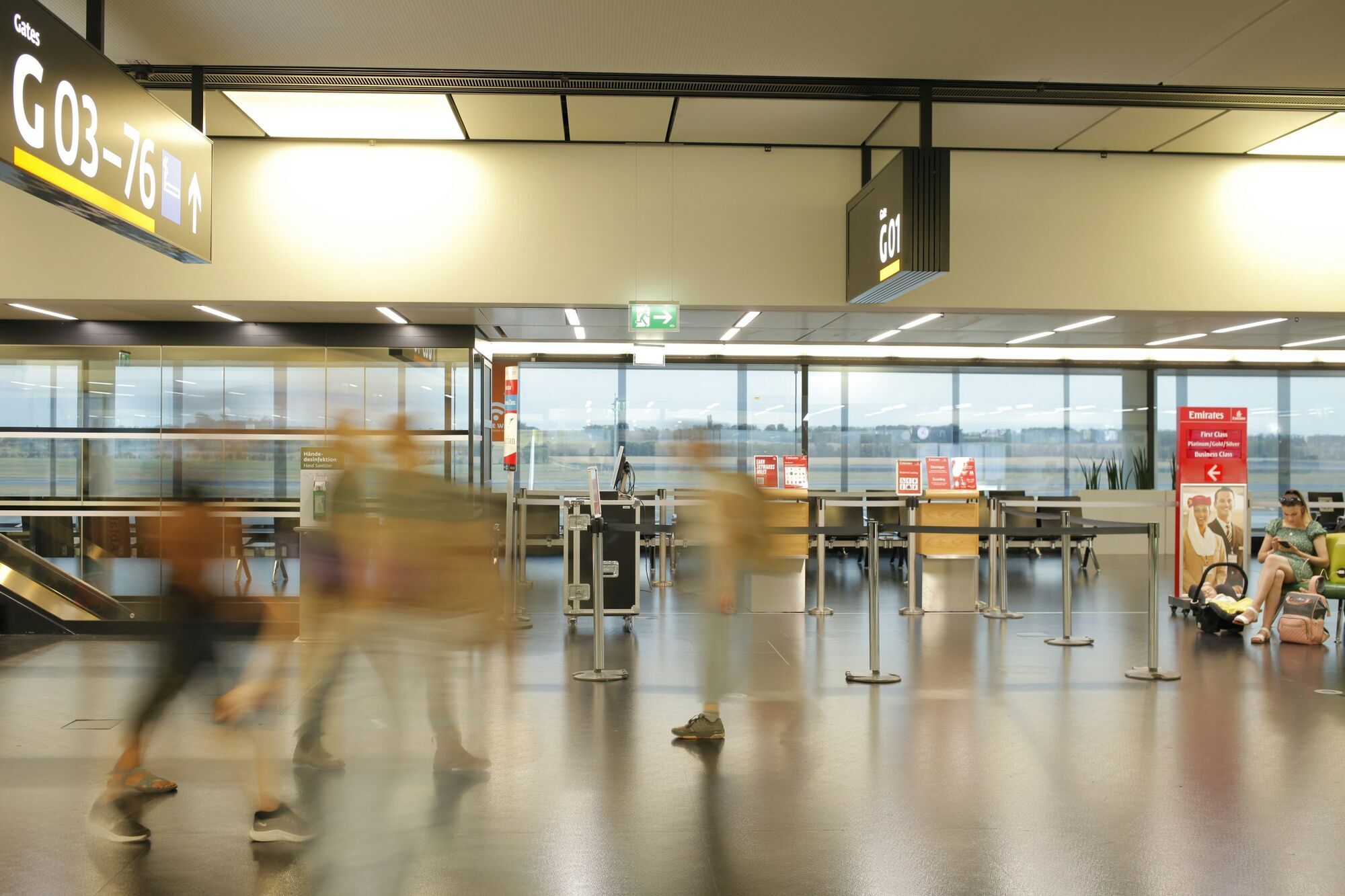 Passengers walking through Vienna Airport gates