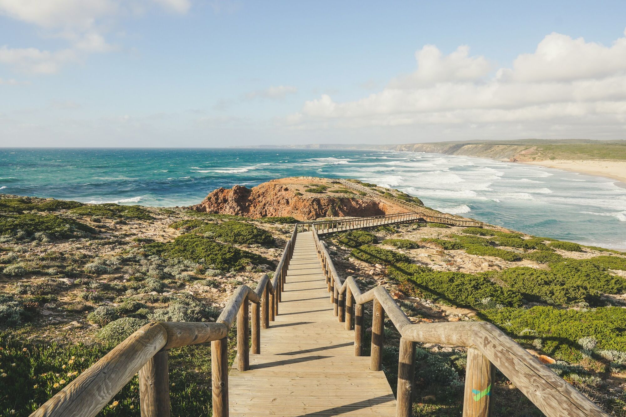 Wooden walkway along the Algarve coast