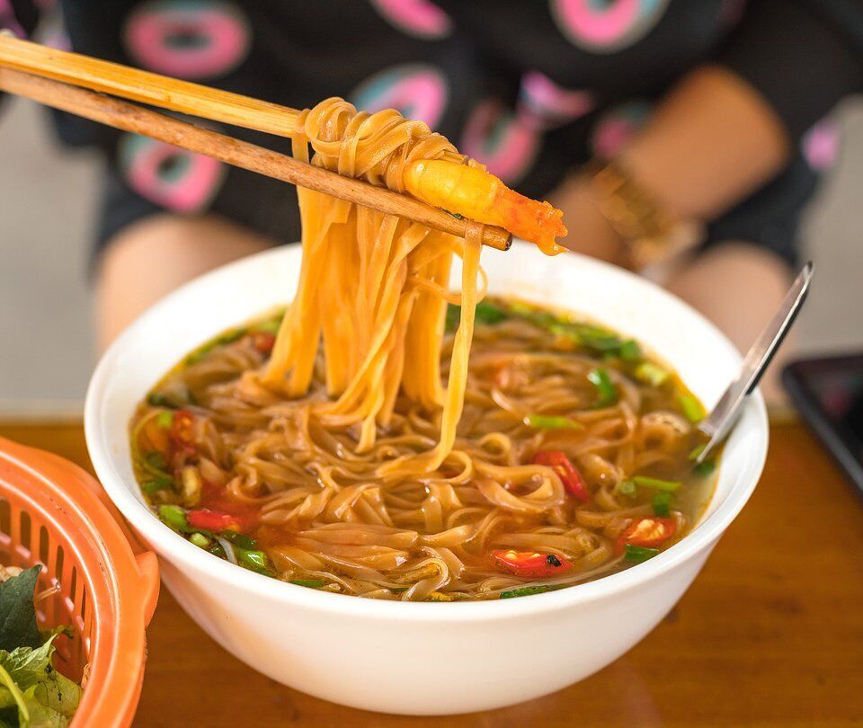 Bowl of Vietnamese noodle soup with prawns