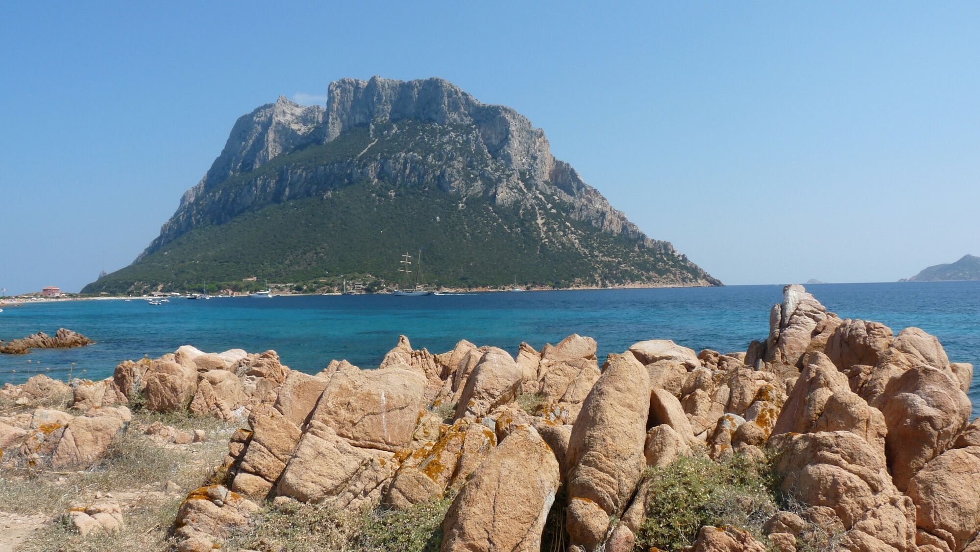 Rocky coastline with Tavolara island views