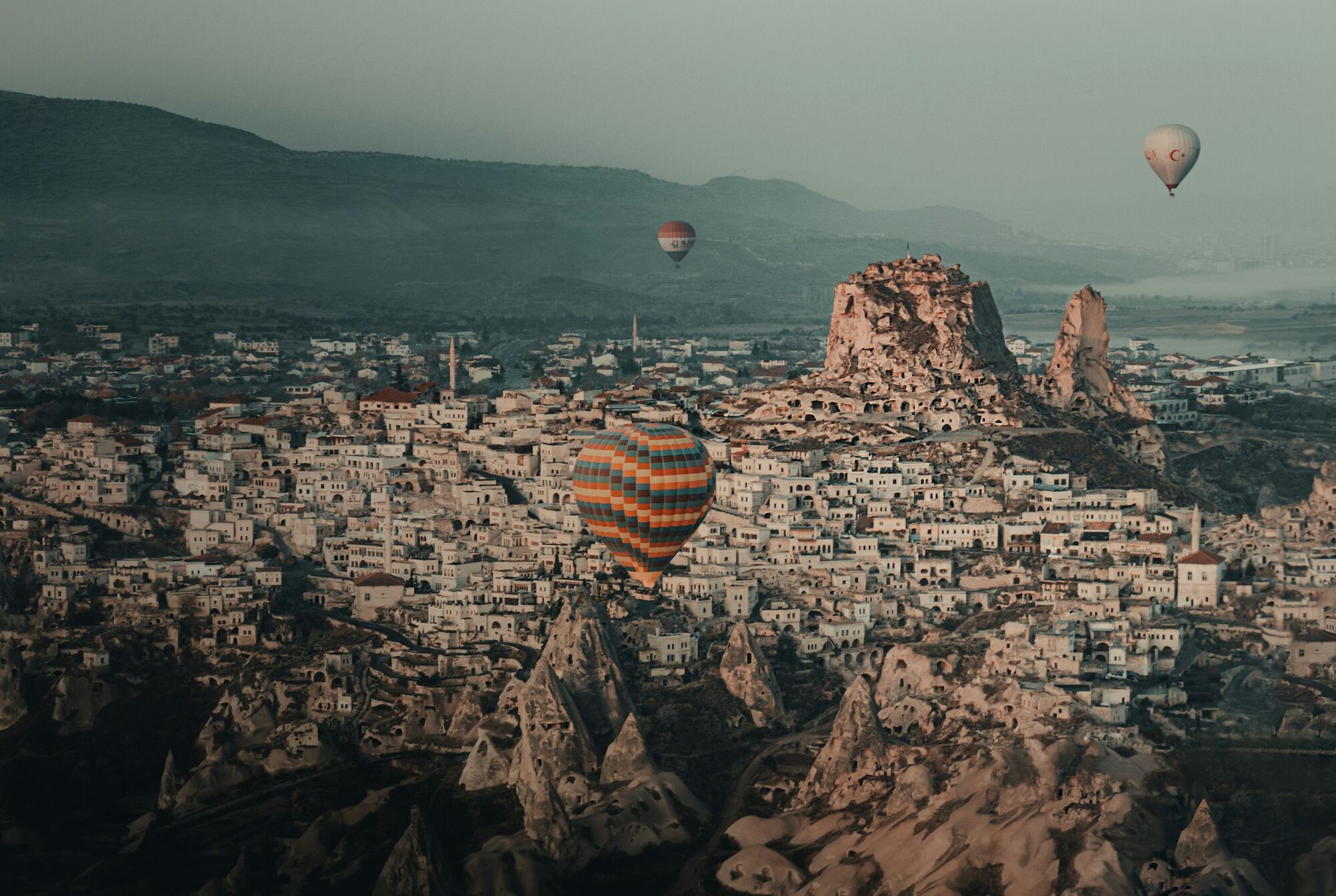 Hot air balloons flying over Cappadocia