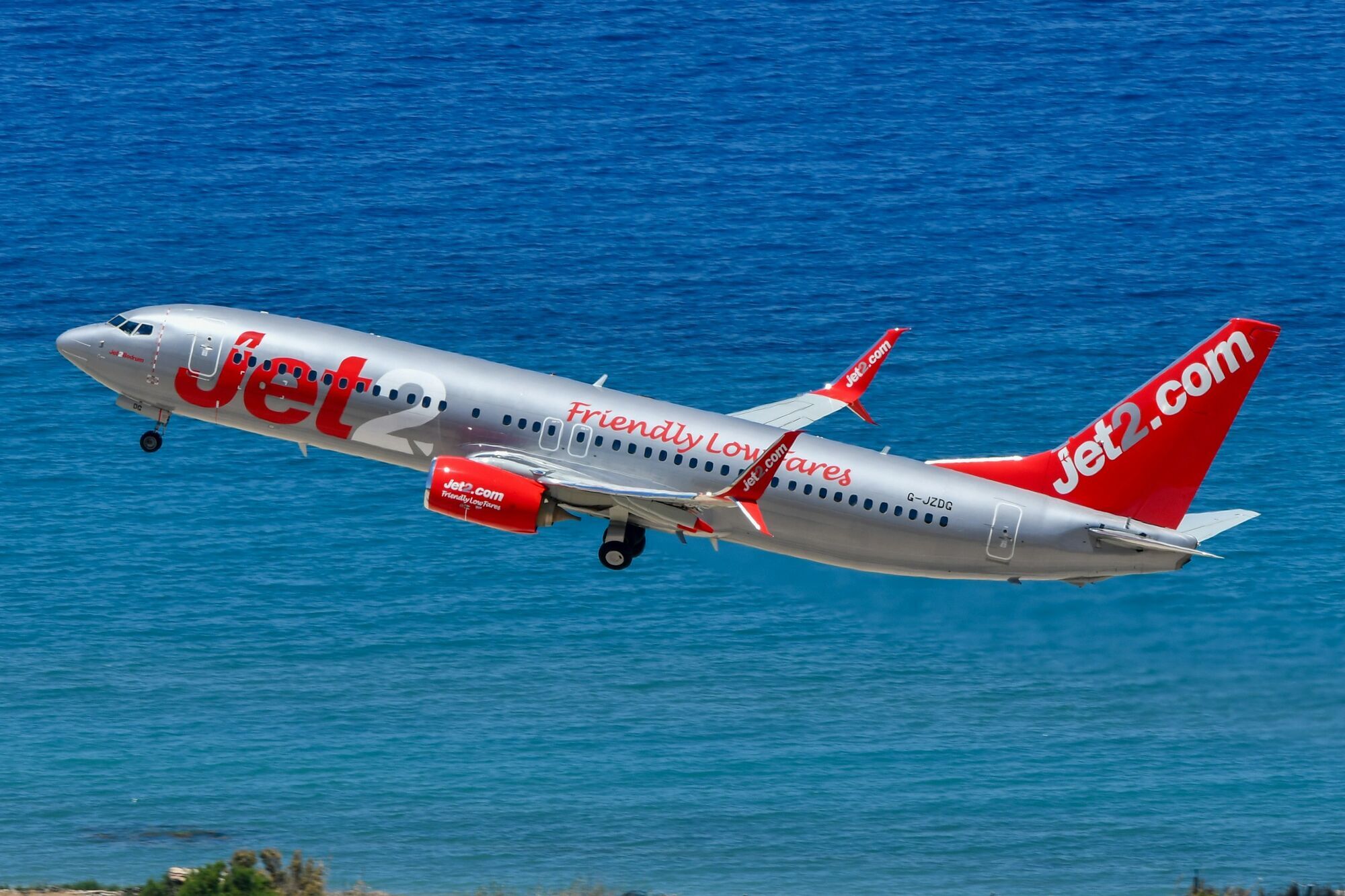 Jet2 aircraft flying above the sea