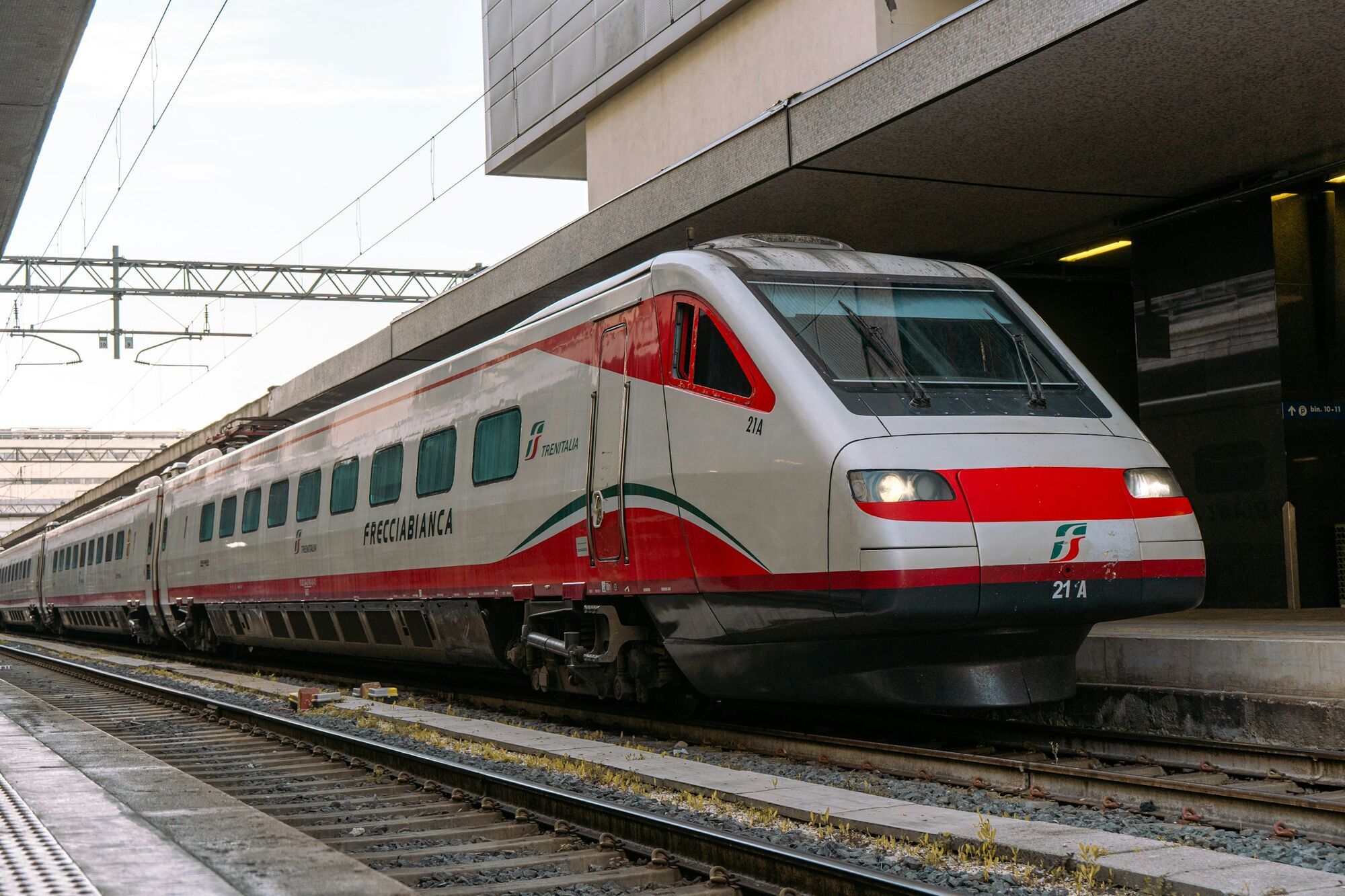 Trenitalia train standing at a railway station