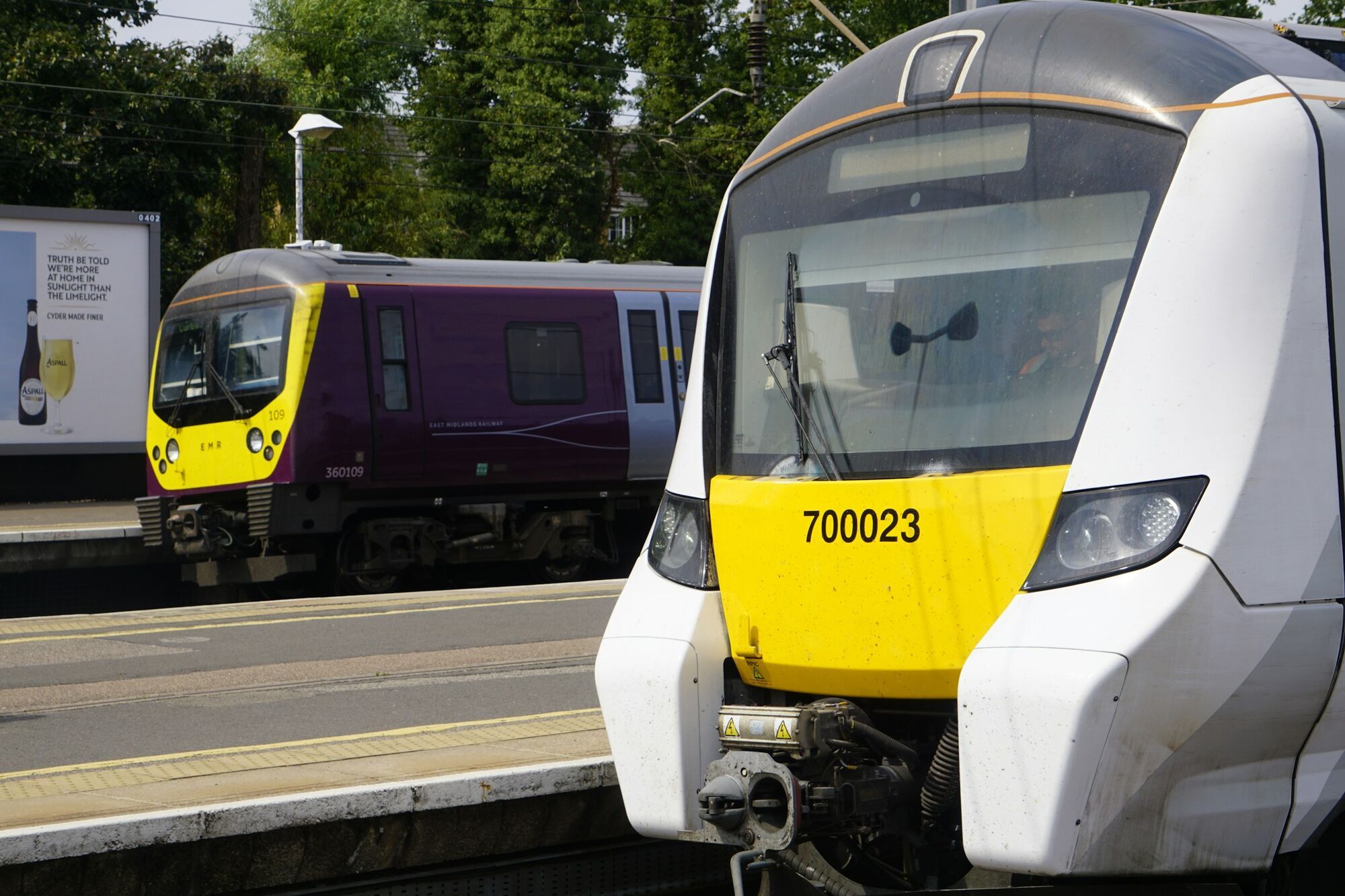 East Midlands Railway trains at a station
