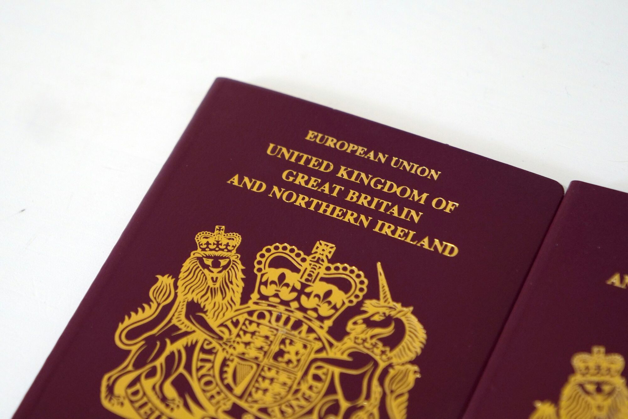 Old burgundy British passport cover