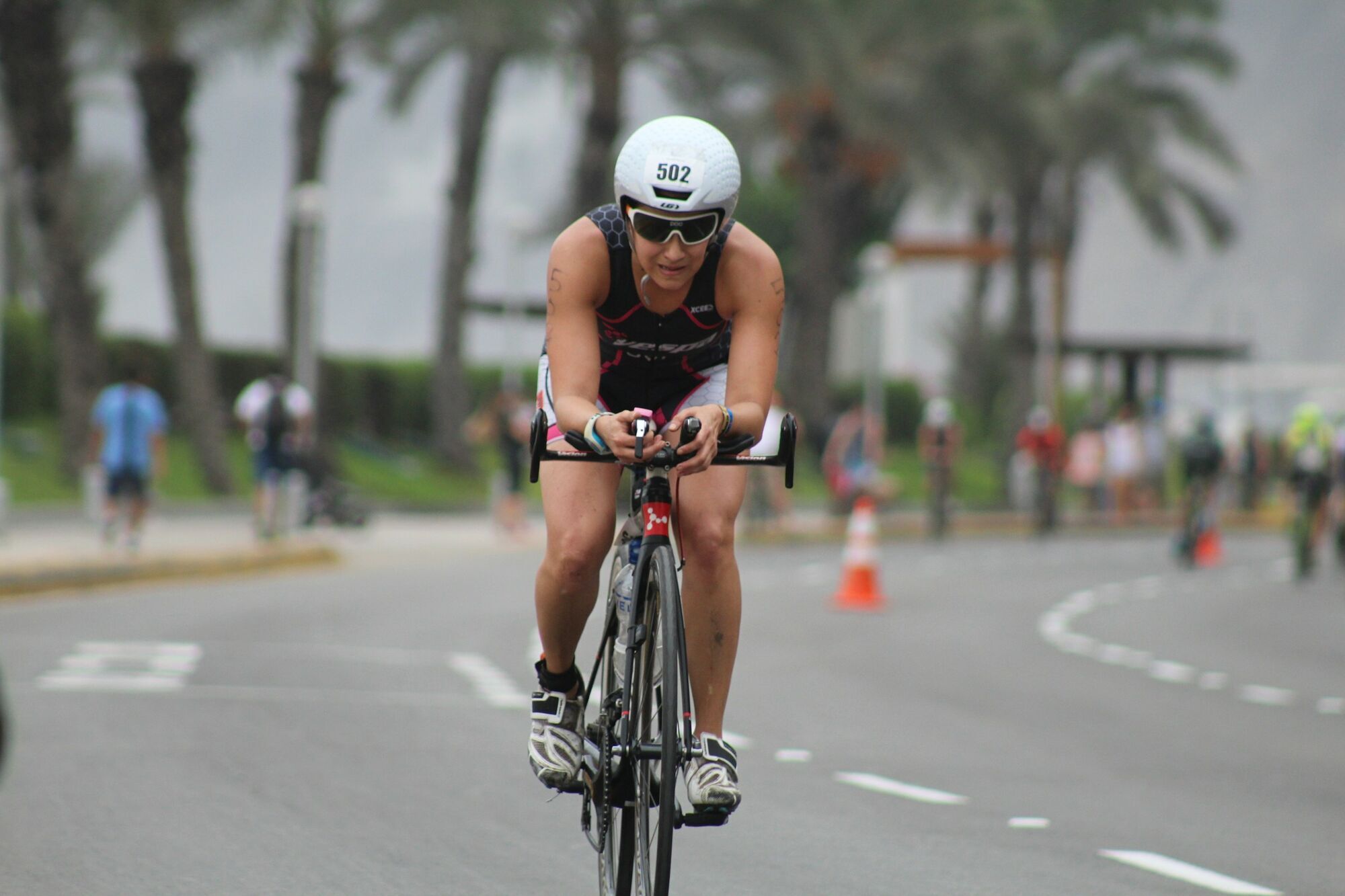 Triathlete cycling during an Ironman race
