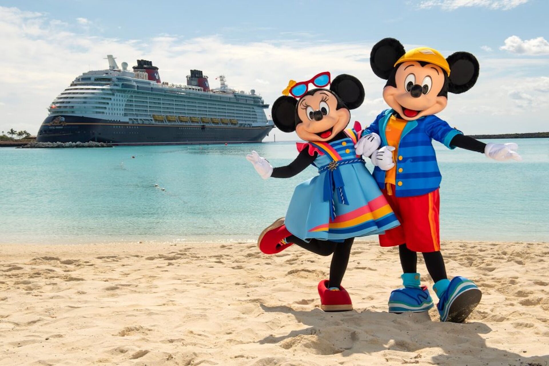 Mickey and Minnie beside Disney cruise ship
