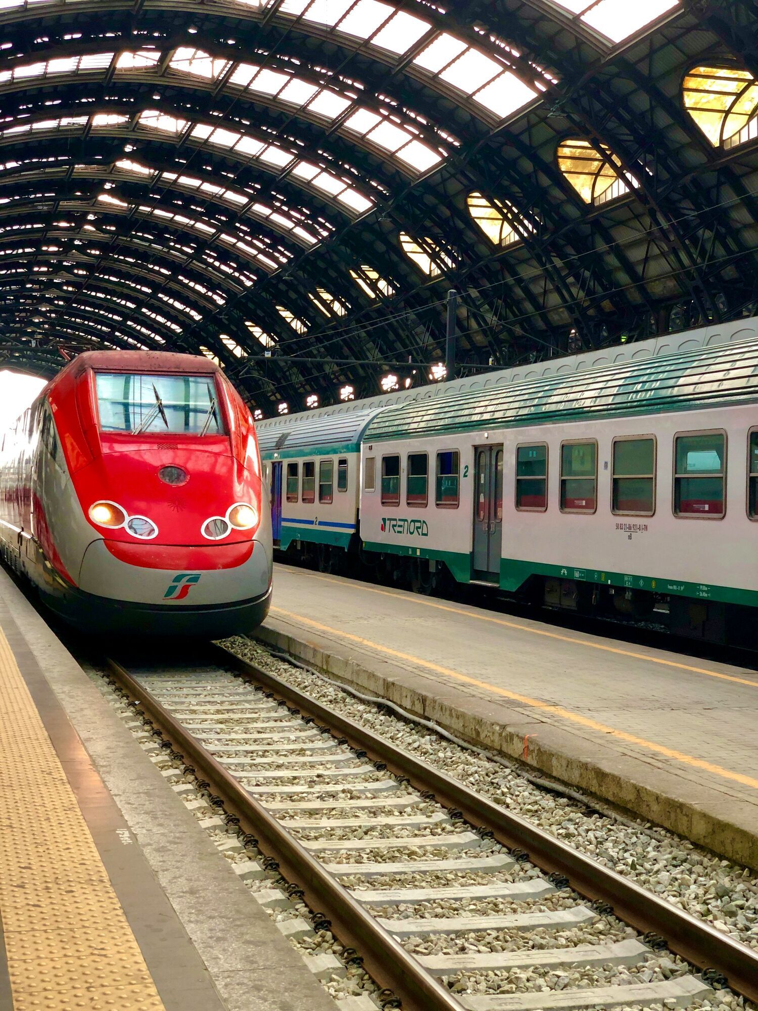 Passenger trains at Milano Centrale station