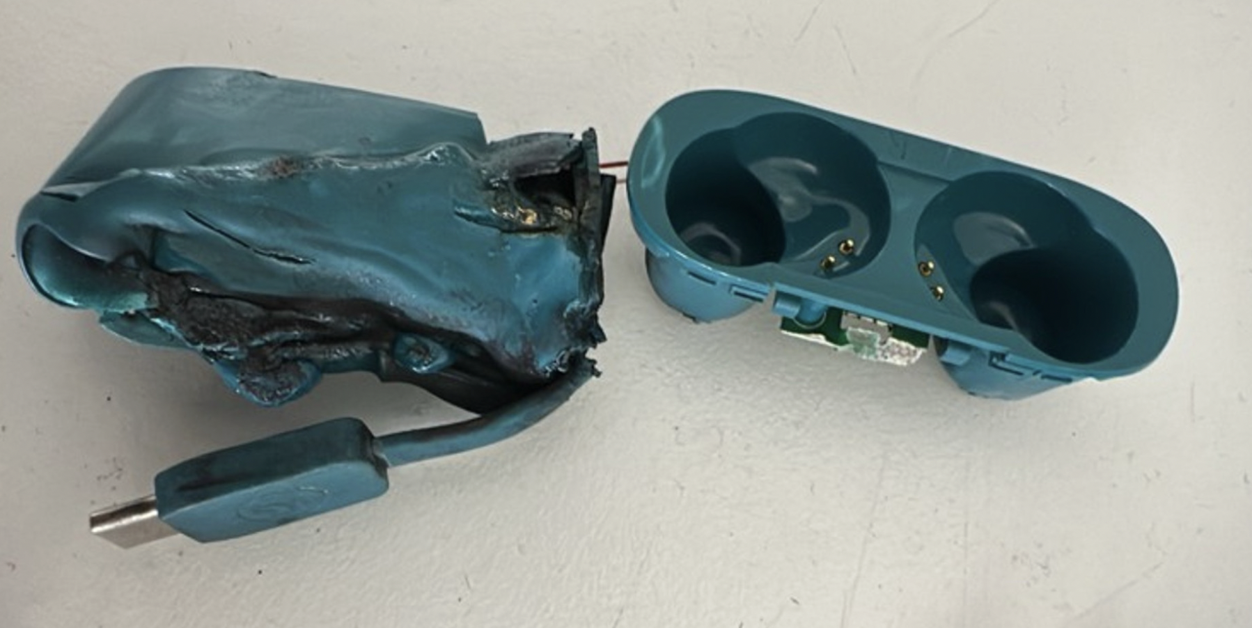 Damaged wireless headphone charging case