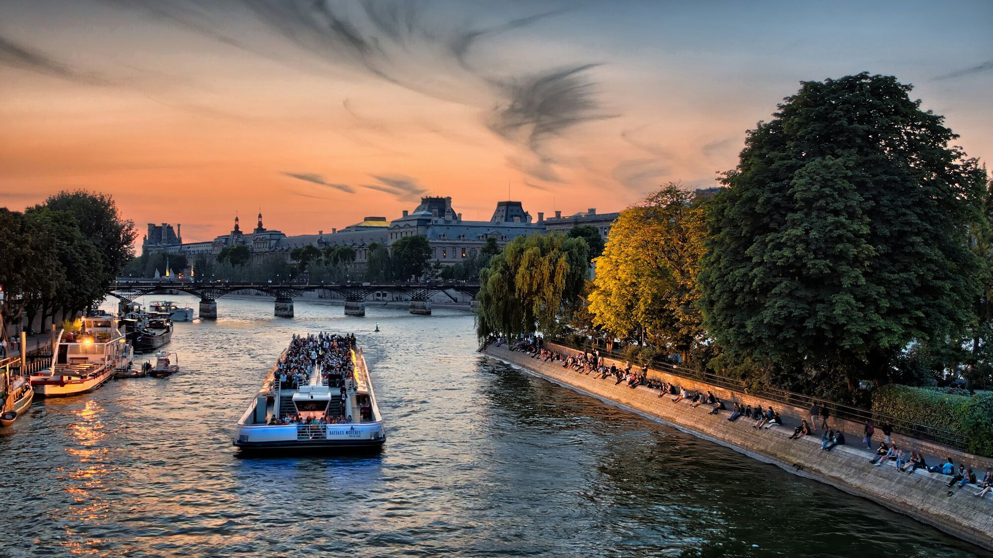 River Seine and sightseeing boat in Paris