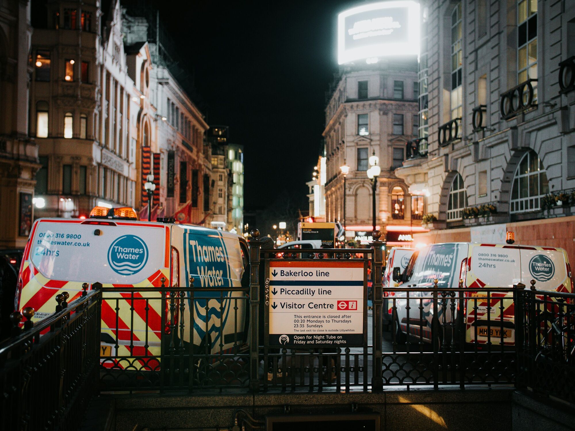 Piccadilly line entrance in central London at night
