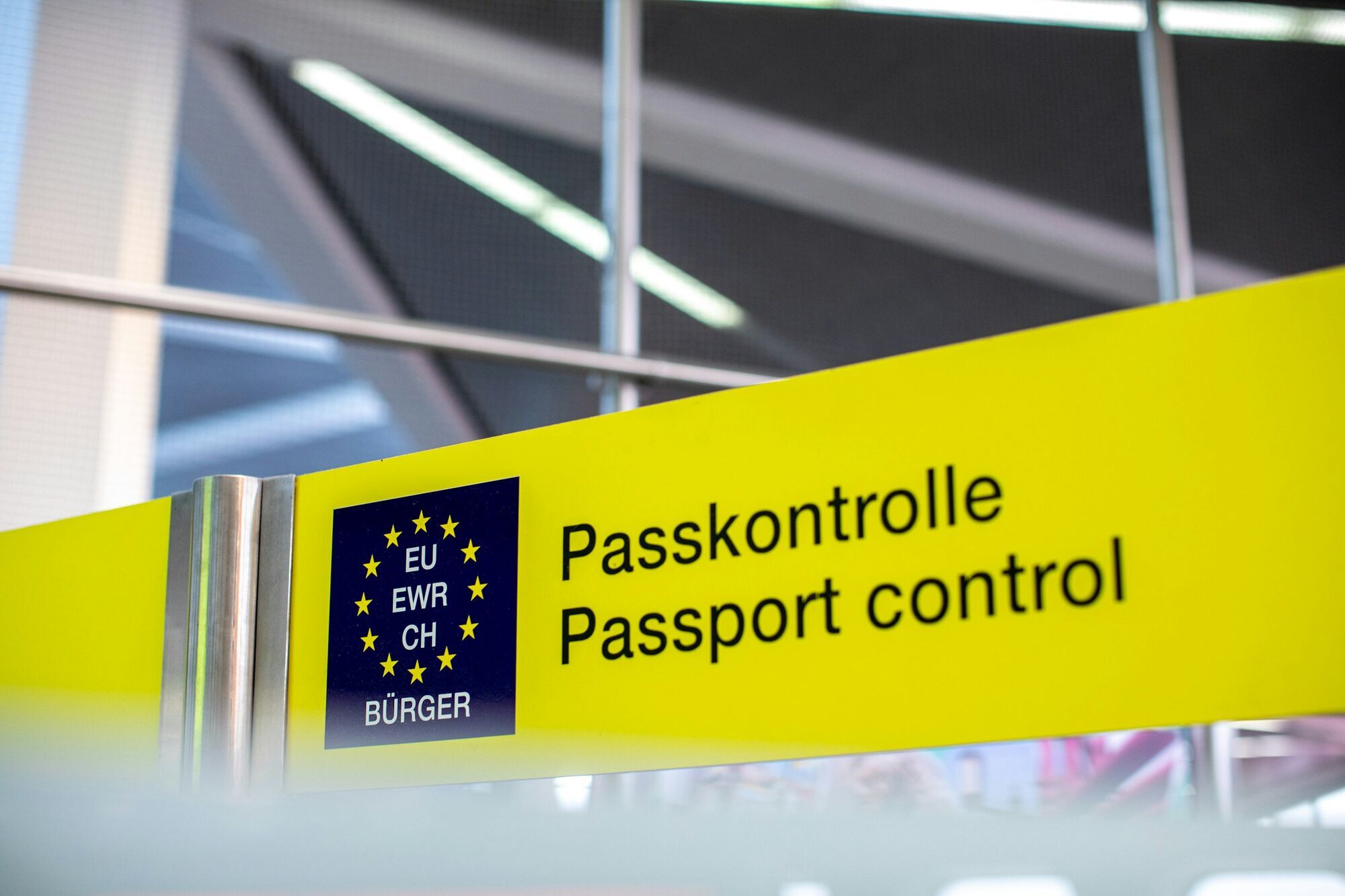 Passport control sign at a European airport