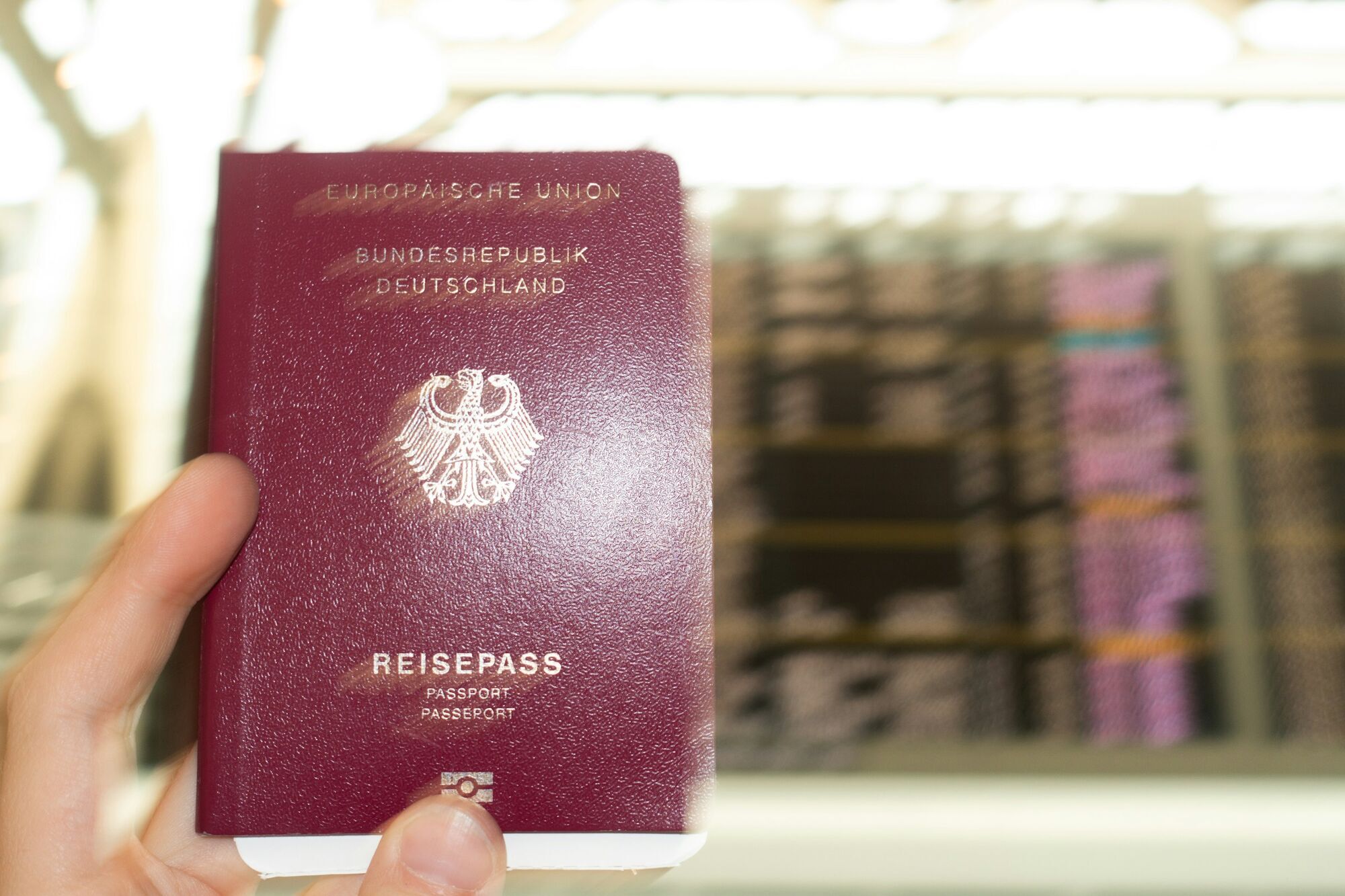 German passport held at an airport