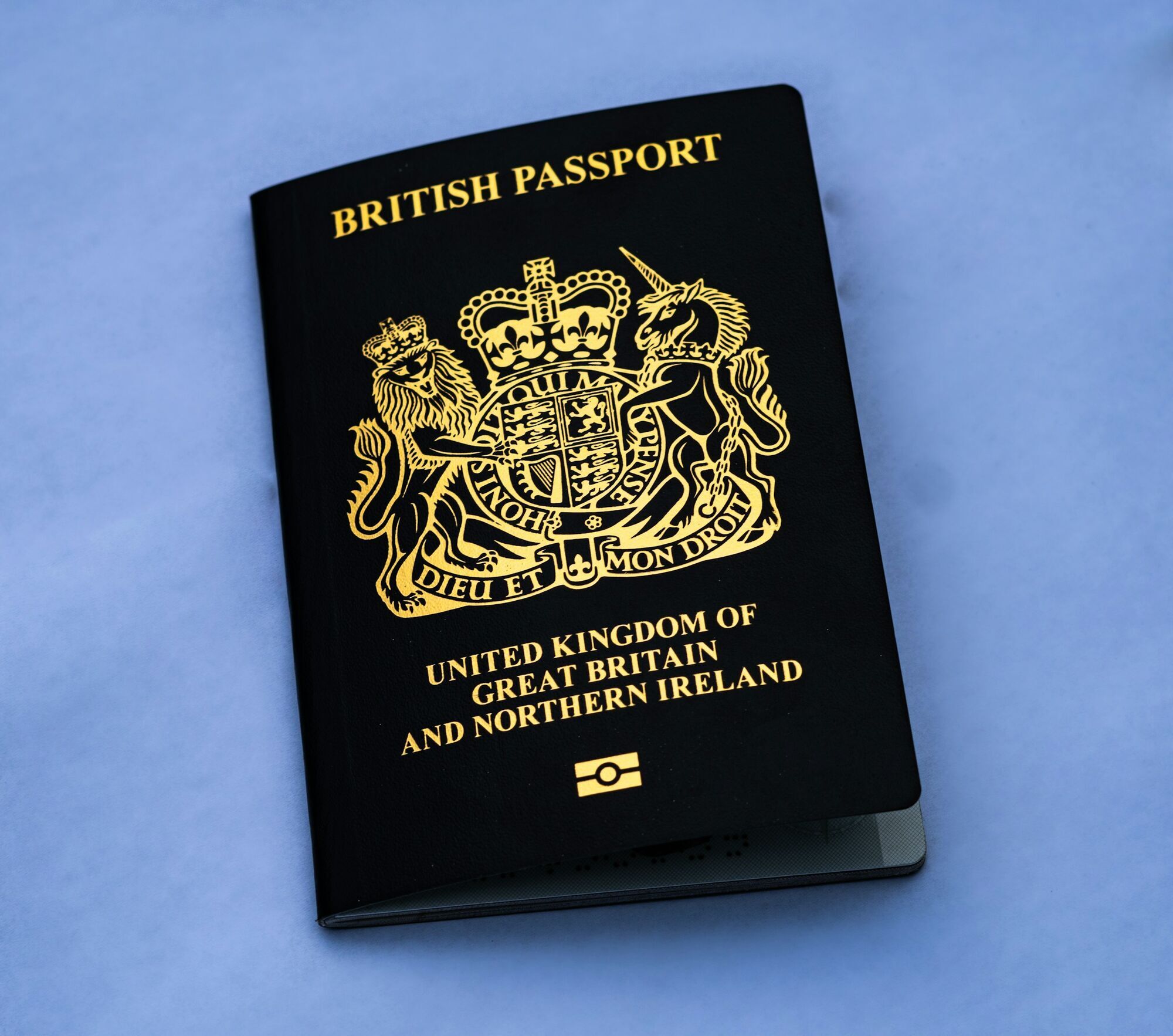 British passport on blue background