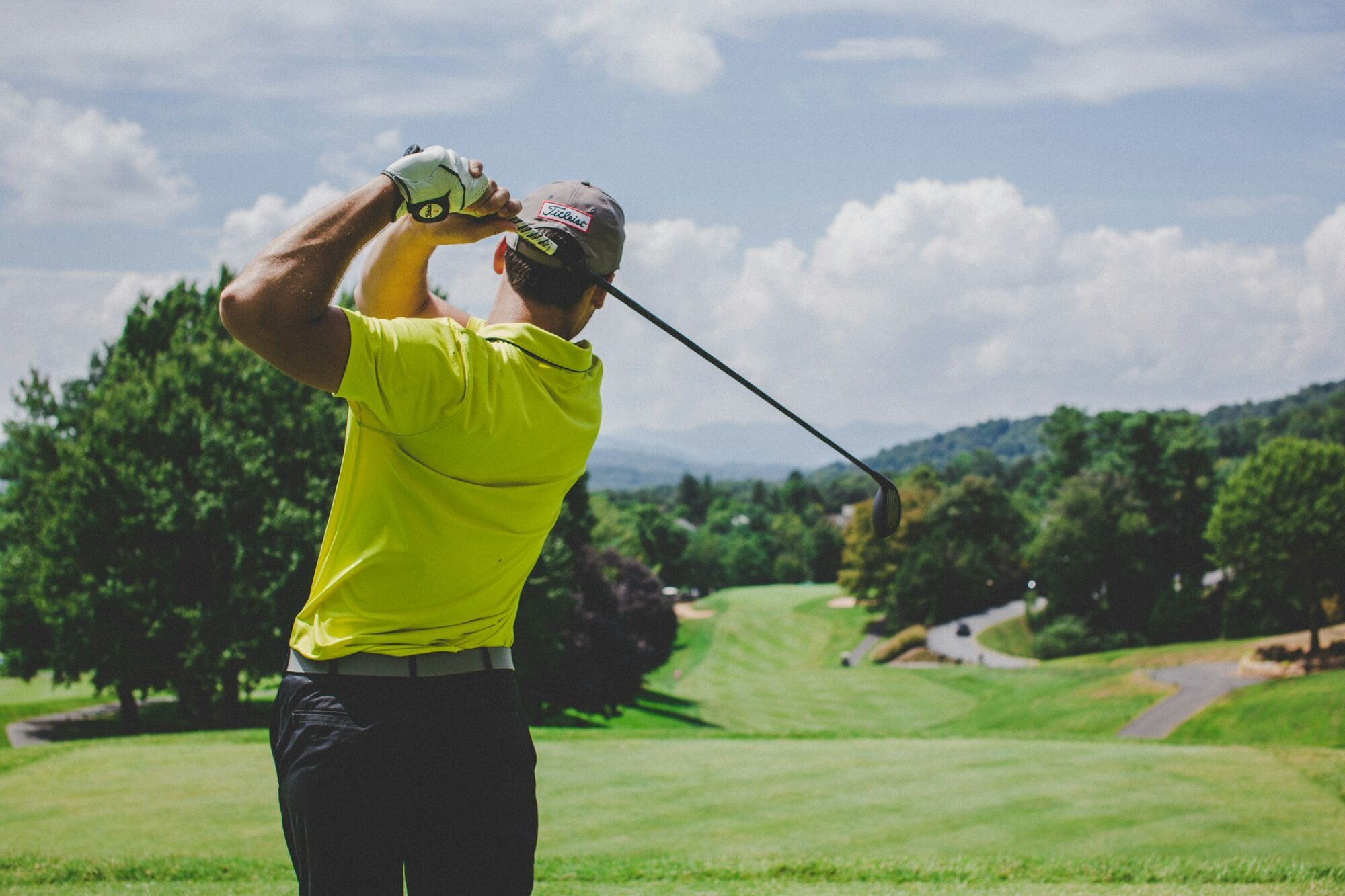 Golfer playing on a green course