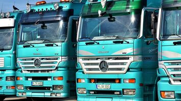 Why some trucks in the EU have two different license plates and what does it mean