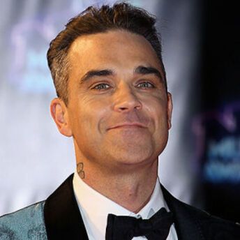 Why Robbie Williams' children fly in economy class when he's in first: details from his wife