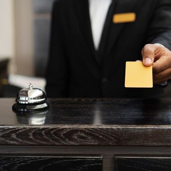 Who, besides maids, should receive tips in hotels