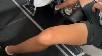 A man stretched his legs into the aisle on a plane