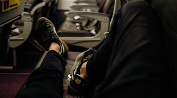 The flight attendant named a common passenger habit that can be traumatic and answered whether it is ethical to take off your shoes