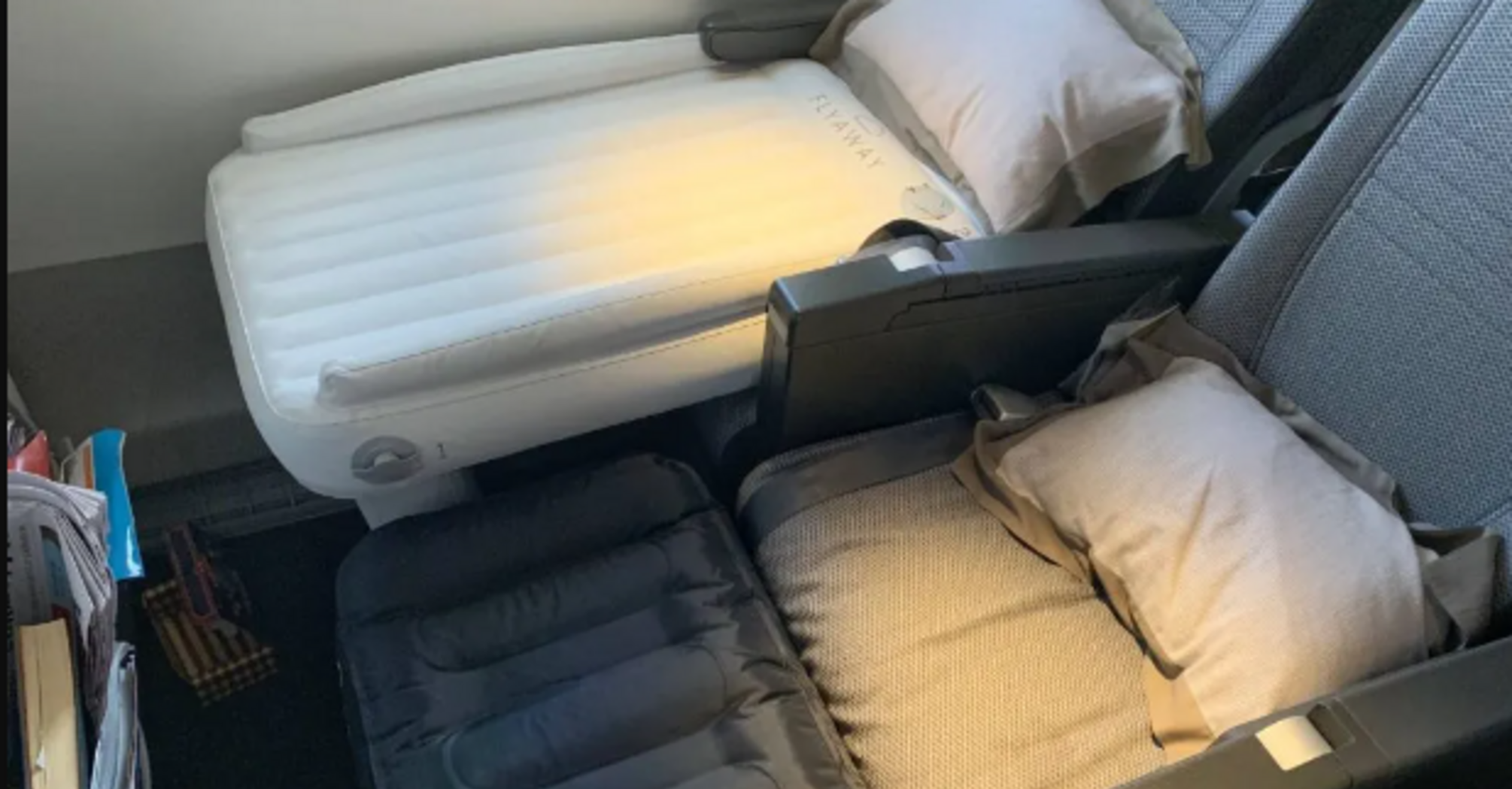 How to turn an airplane seat into a bed