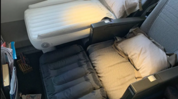 How to turn an airplane seat into a bed