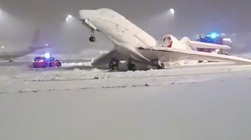 Germany covered with snow: An airplane froze to the runway at Munich airport