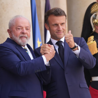 French President Emmanuel Macron greets Brazilian President Luiz Inácio Lula da Silva at the Elysee Palace 