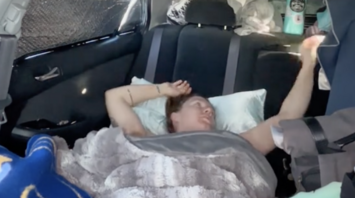 A woman lives in her car, saving thousands of pounds, and feels really happy