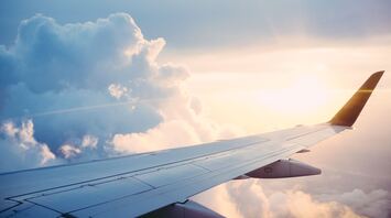 Airplane wing, clouds
