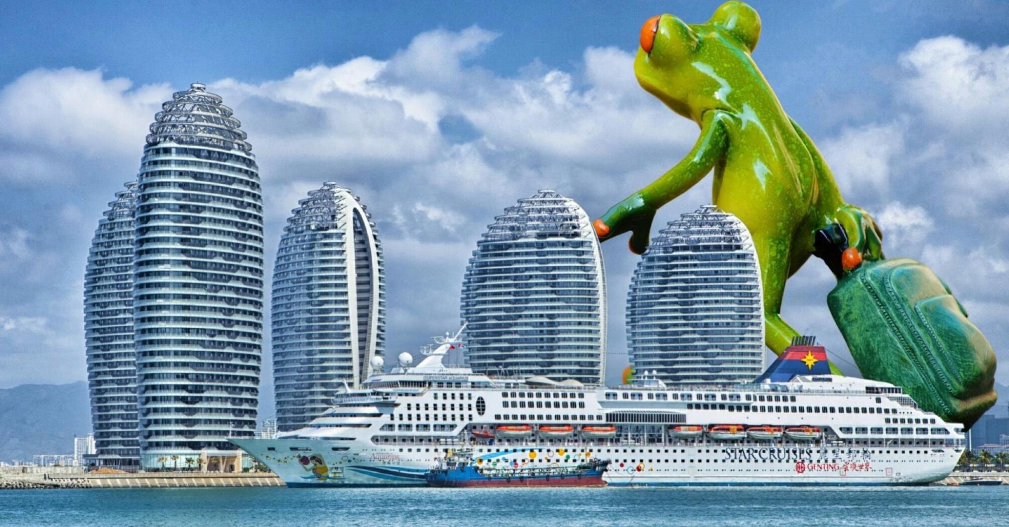 A large green frog sculpture with a briefcase against a backdrop of a city with several spiral-shaped high-rise buildings and a cruise liner at the dock