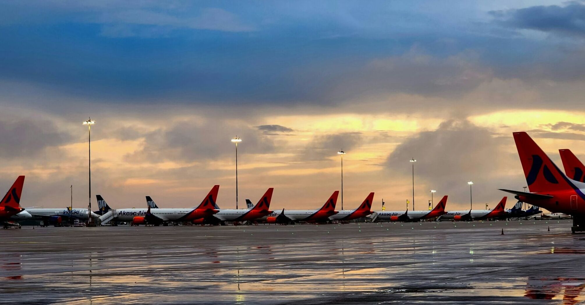 A row of Akasa Air airplanes