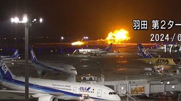 Crash in Japan: Japan Airlines plane burst into flames during landing (video)