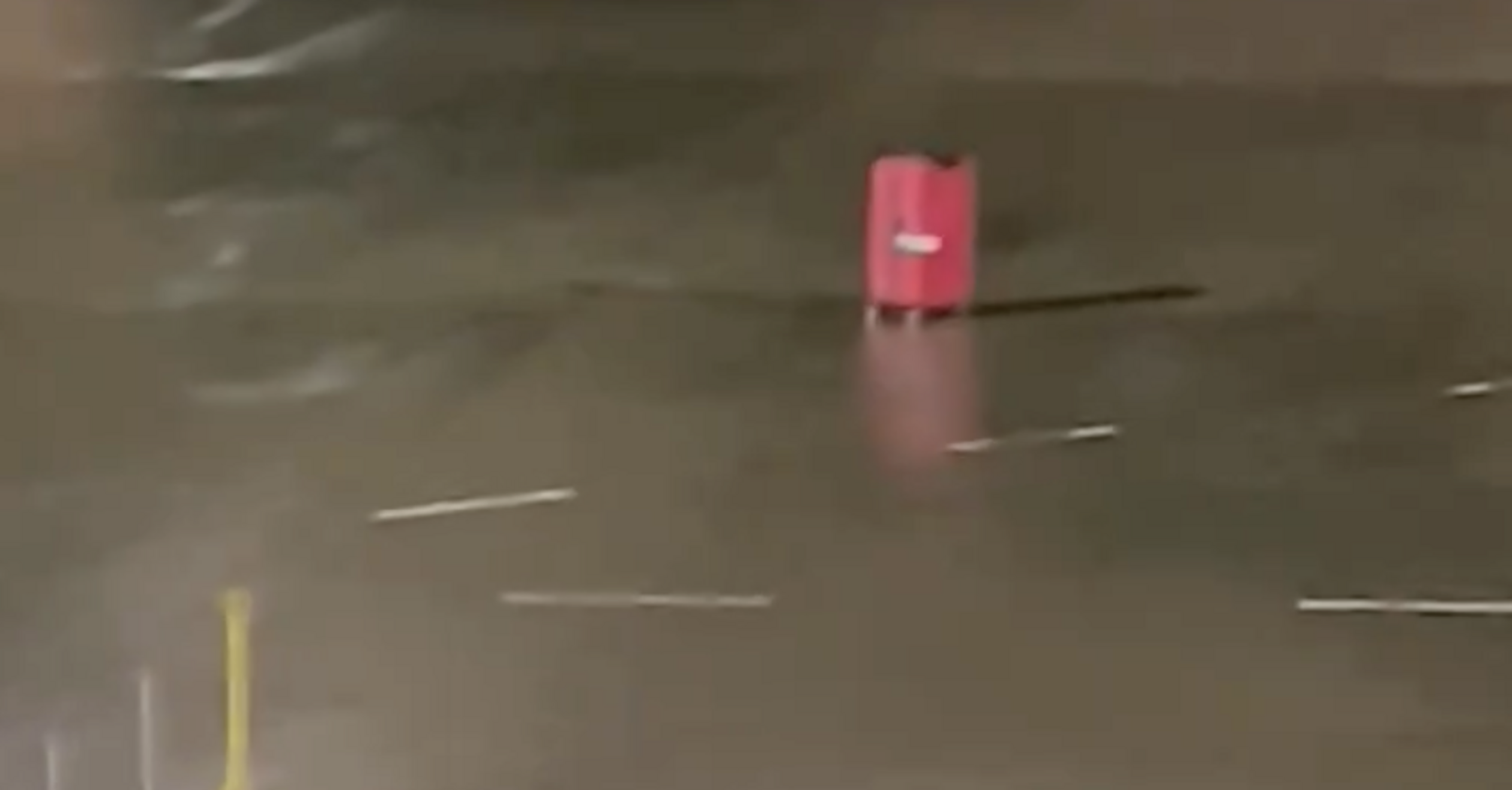 Video of a lone suitcase rolling down a runway at the height of Isha storm makes the Internet laugh
