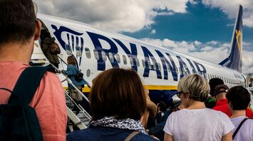 Passengers boarding a Ryanair airplane